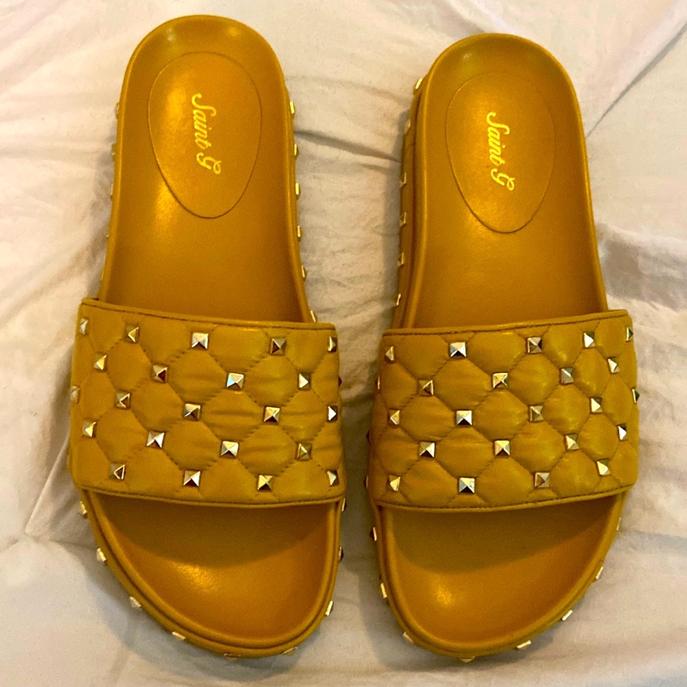 Saint G yellow and gold studded slides. Size 11. Never worn. New in box